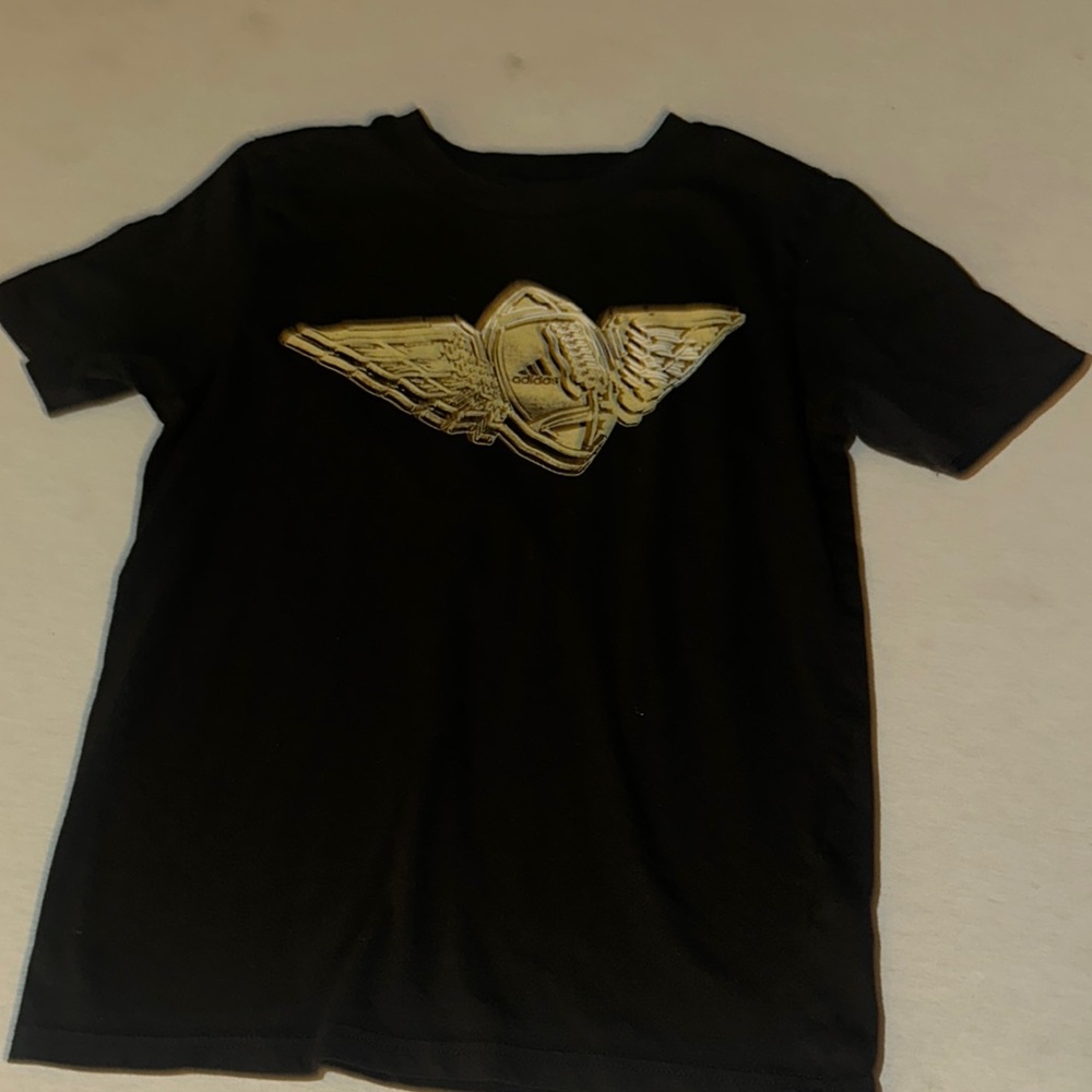Adidas Kids Size Medium Black T-Shirt with Gold Winged Logo.